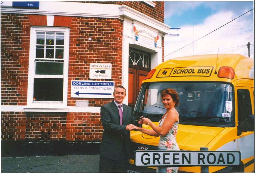 Martin handing the keys over to one of our first customers First Class Day Nursery in 2001