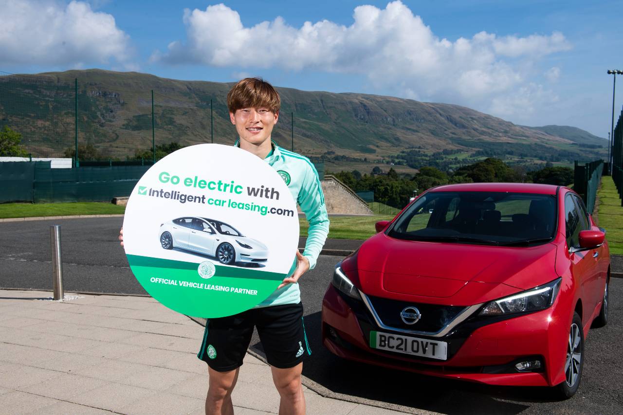 Kyogo Furuhasi with one of the Nissan Leaf vehicles from Intelligent Car Leasing